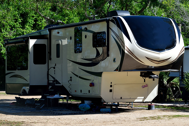 Fifth wheel camper parked while receiving rv inspection services